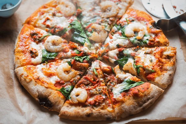 Elevate Your Pizza Night with Garlic Shrimp and Three Cheeses